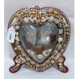 An Edwardian shell-work souvenir diorama, of heart form, with lithograph in colours depicting a