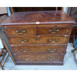 A George III mahogany chest, the yew veneered top over two short and three long drawers on plinth