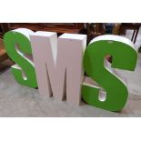 Two painted wood shop fitting 'S' letters and an 'M' letter. 39' high