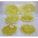 Six Victorian pressed vaseline glass dishes, the largest example 8' wide