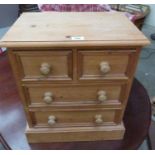 A small pine chest of drawers. 19' wide