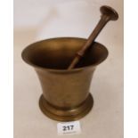 A bell metal pestle and mortar
