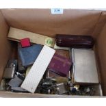 A box of sundries to include pens, watches, vintage lighters etc.