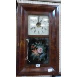 An American mahogany cased wall clock with two train weight driven movement. 25½' high