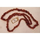 A necklace of naturalistic amber beads. 119g approx.