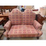 A Queen Anne style sofa with double chair back. 60' wide