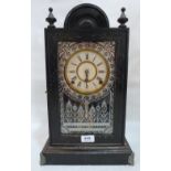 An American ebonised mantle clock. 17' high