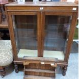 An oak glazed china display cabinet and an oak hanging spice rack