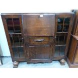 A 1930s oak side-by-side bureau