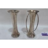 A pair of Edward VII silver vases of stylised form. Birmingham 1902. 6' high. Loaded, one A.F.
