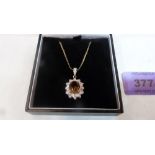 A 9ct yellow citrine and diamond pendant 3.5g gross