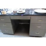 An industrial style steel pedestal desk 60' wide