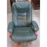 A green leather reclining chair