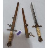 Germany. Kriegsmarine pair of naval daggers by E & F Horster with brass hilts, white celluloid handl