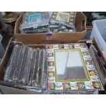 Two boxes of frames, some with mirror plates
