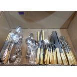 A quantity of plated and bone handled cutlery