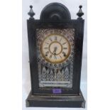 An American ebonised mantle clock. 17' high