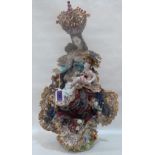 A continental Catholic ceramic group of the crowned madonna and Christ child. 22' high. Losses,