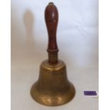 A Victorian hand bell with turned treen handle. 10½' high