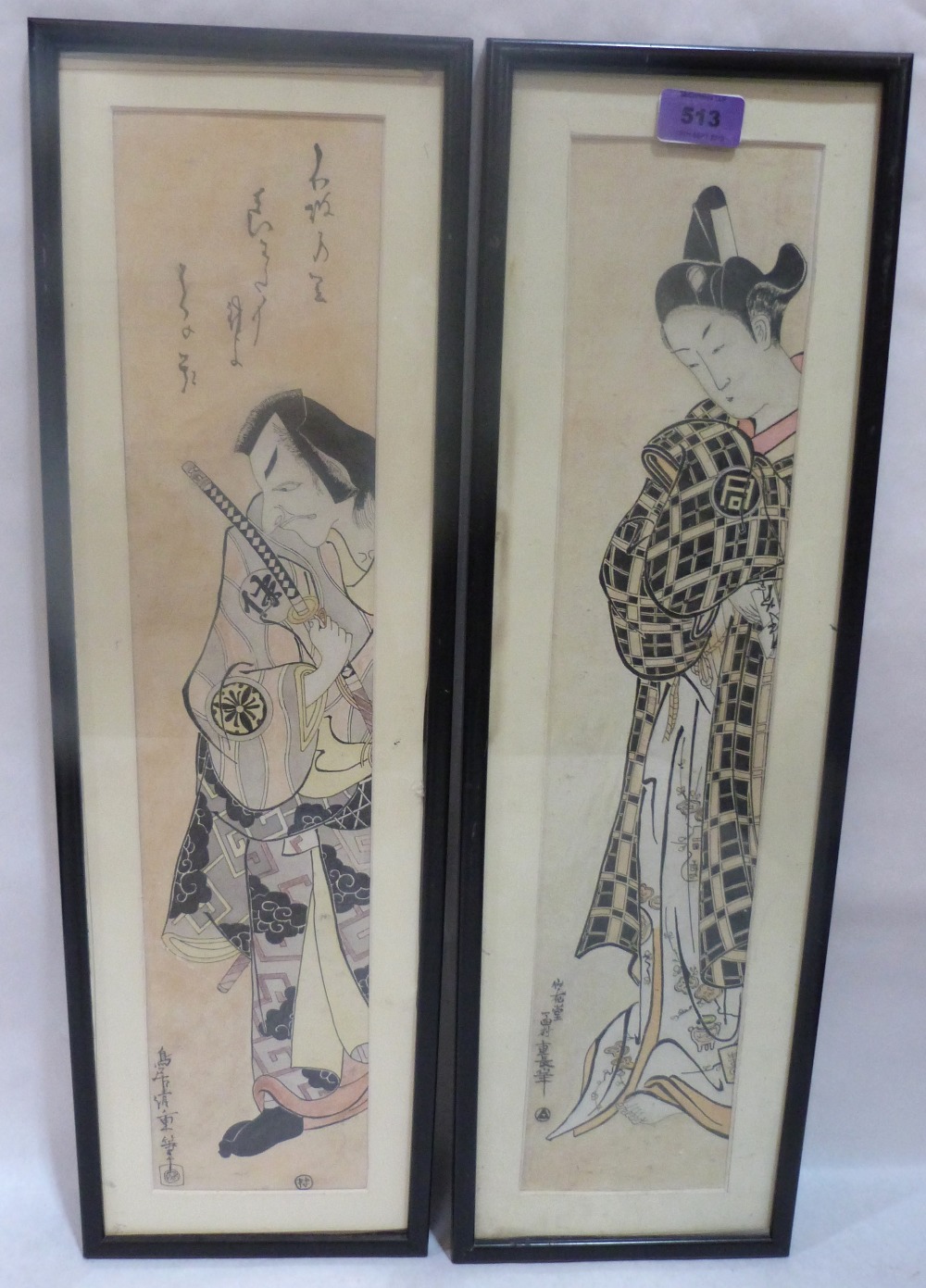 A pair of Japanese woodblock prints. 21½' x 4½'