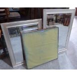 A folding bridge table and two wall mirrors with silvered frames