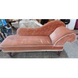 A Victorian chaise-longue upholstered in pink buttoned Dralon