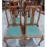 A set of four Queen Anne style inlaid dining chairs