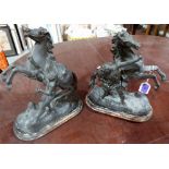 A pair of late 19th century French speltar horse and figure groups