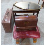 A mahogany tea trolley, a brass framed mirror, a camel stool, a vintage suitcase and a Singer sewing