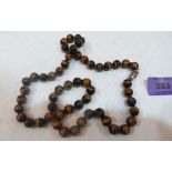 A necklace of Tiger's eye beads