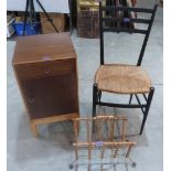 An Arts and Crafts style rush seat chair, retro magazine rack and bedside cabinet