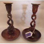 A pair of treen open twist candlesticks. 8½' high
