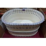An Italian blue and white decorated footbath of recent manufacture. 18' wide
