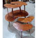 Four assymetric occasional tables and a similar coffee table