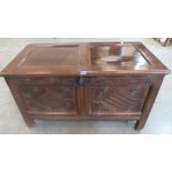 A late 17th/early 18th century joined oak chest with scratch carved geometric two panel front raised