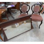 An early 20th century mahogany overmantle with bevelled plate. 46' wide. Together with a pair of