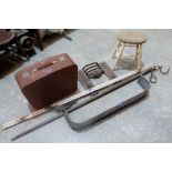 A brass fender, painted stool, suitcase, cast iron fire grate, clothes airer etc.