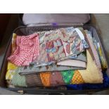 A suitcase of vintage textiles