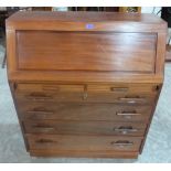 A hardwood bureau, the sloping fall over two short and four long drawers. 36' wide