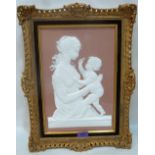 A Royal Worcester plaque 'Mother and Child' modelled by Arnold Machin R.A. Limited edition no. 57/