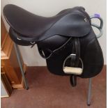 A Fieldhouse Saddlery hunting saddle with metal stand. As new