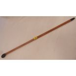 A malacca walking cane with ebonised pommel