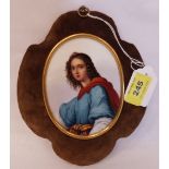 A 19th century German porcelain plaque, painted with a young lady. Velvet framed. 7½' high
