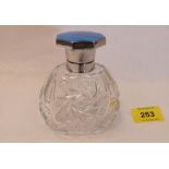 A glass scent bottle with blue enamel lid. 4¼' high