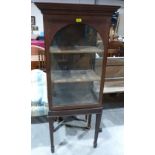 A mahogany glazed display cabinet on stand