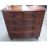 A Victorian mahogany bowfronted chest of two short over three long drawers on turned feet. 43' wide