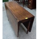 A 19th century dropleaf table on ring turned legs. 39' wide (A.F.)