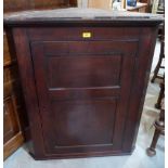 An oak corner cupboard. 19th century 42' high