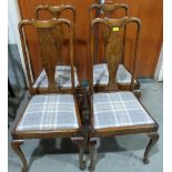 A set of four Queen Anne style dining chairs