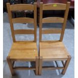 A pair of beechwood ladderback chairs